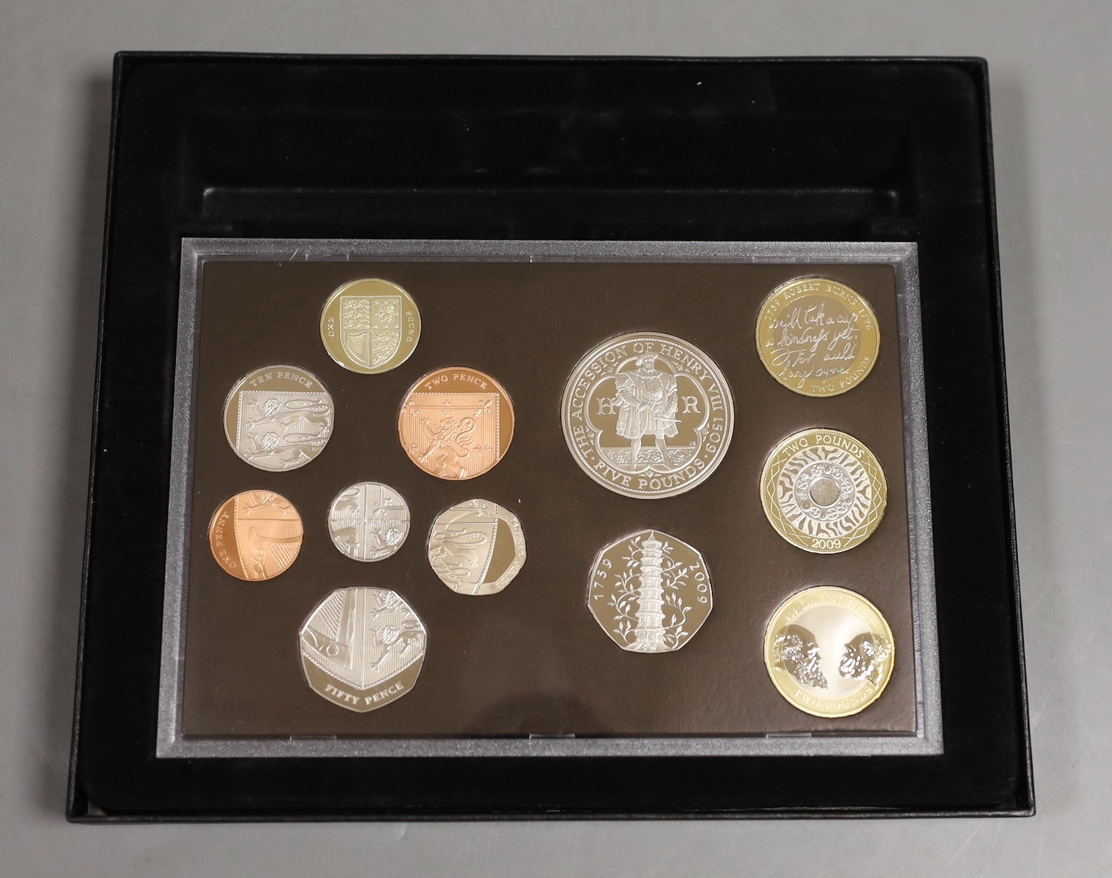 A cased Royal Mint UK proof coin year set for 2009 including the scarce Kew Gardens 50 pence